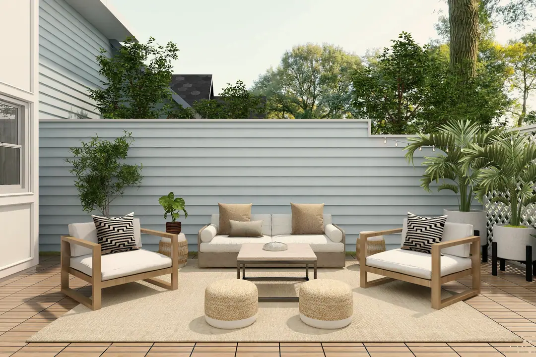 Patio exterior con sofás y plantas
