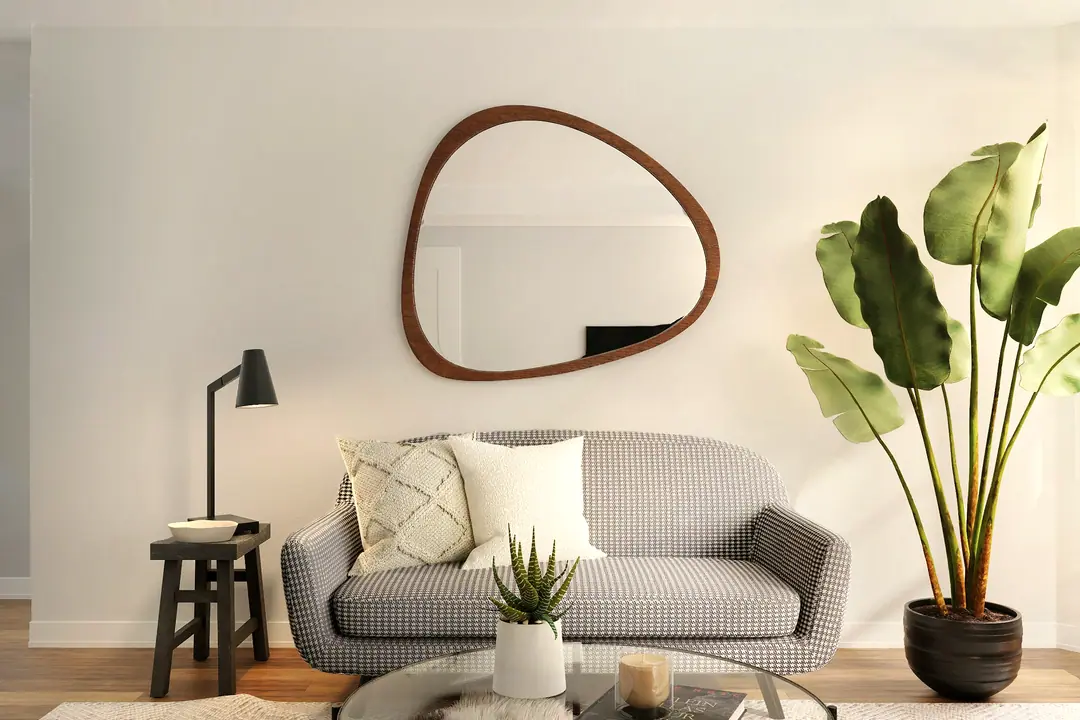 Salón con espejo orgánico y plantas