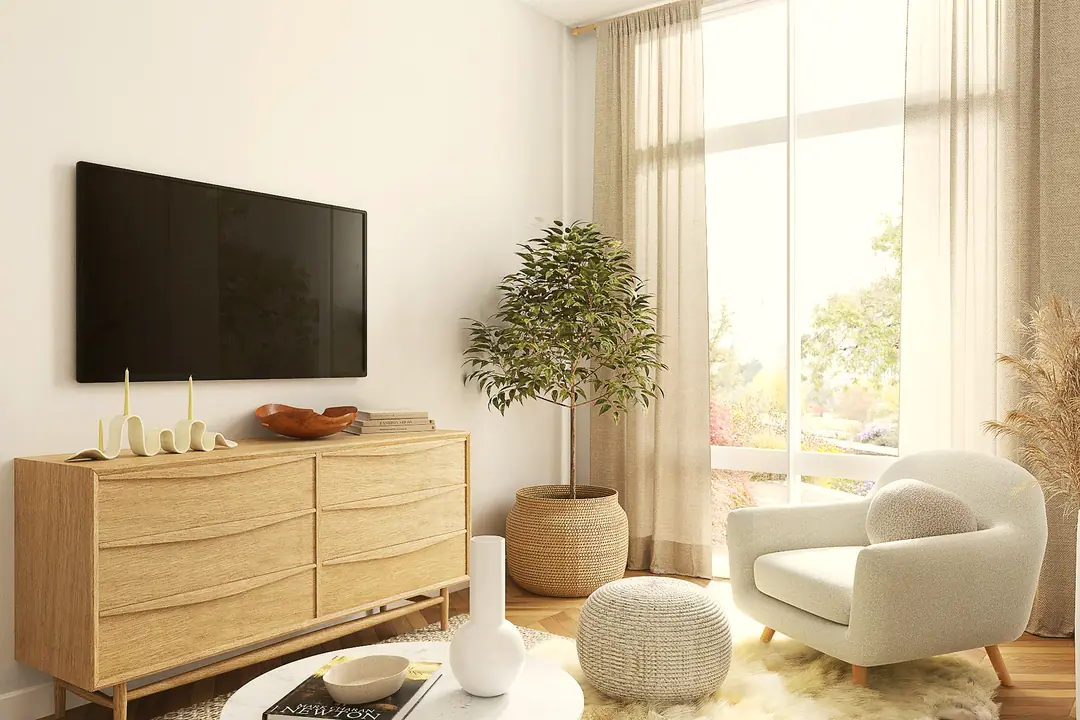 Salón con mueble de madera clara y butaca