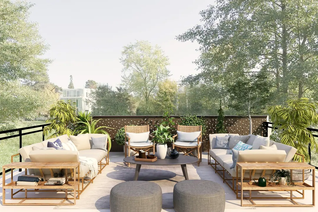 Terraza de ático con sofás de exterior (recreación)